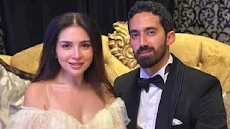 أحمد تيمور يرد على تهنئة تامر حسني بعد عقد قرانه على مي عز الدين