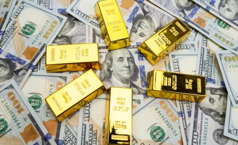 انخفاض طفيف للذهب مع ارتفاع الدولار